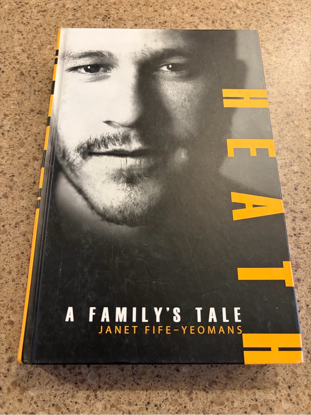 HeatH A Family's Tale Hardcover Book - Black and Yellow